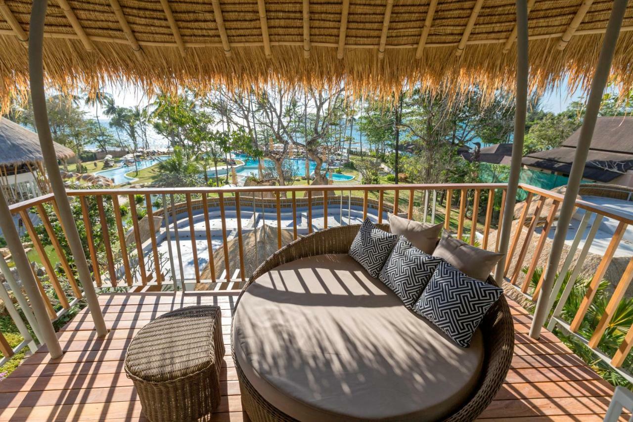منتجع وسبا عدن بيتش خاو لاك المظهر الخارجي الصورة The view from the balcony of a pool villa at the resort